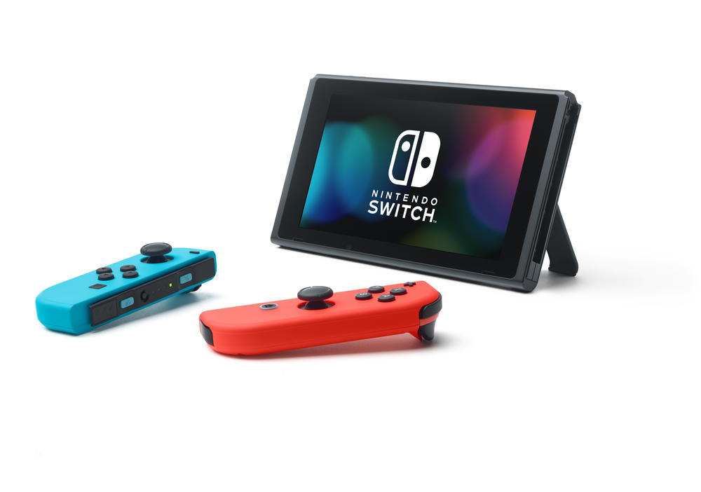 Nintendo Switch + paire de Joy-Con rouge néon et bleu néon