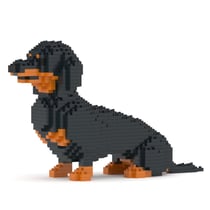 Chien Teckel assis noir et feu Taille standard | JEKCA | 14 ans et +