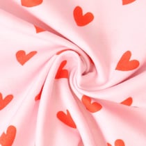 Tissu Flanelle de Coton Caline cœurs Rouges sur fond Rose