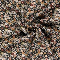 Tissu Crêpe de Viscose Bérengère fleurs Blanches sur fond Noir