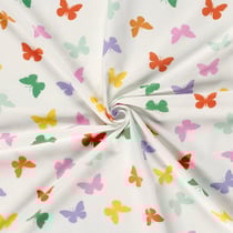 Tissu Jersey Coton Papillon vert, rouge, jaune et lilas sur fond Blanc