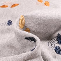 Tissu Sweat Léger envers gratté Arc en ciel brodés ocre sur fond Gris chiné - Au mètre