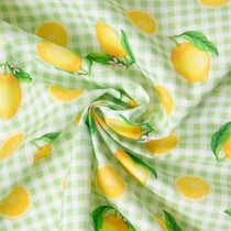 Tissu Coton imprimé Carreaux verts et citrons jaunes sur fond Blanc