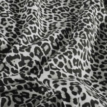 Tissu Sweat léger French Terry Maïa extensible léopard Noir sur fond Blanc