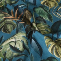 Tissu Toile de Coton Canvas Feuilles tropicales sur fond Bleu canard