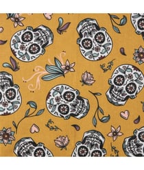 Tissu coton Têtes de Morts de 150 cm de largeur Jaune vendu par 50 cm
