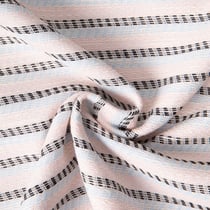 Tissu Jacquard Polycoton lurex Neela rayures Bleu et Noir sur fond Rose pastel