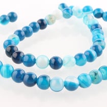 Fil de 60 perles ronde en pierre naturelle 6 mm AGATE RAYEE TEINTEE BLEU