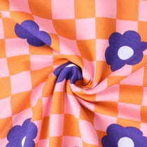 Tissu Sweat léger envers molletonné Jade fleurs Violettes sur fond Rose