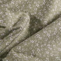 Tissu Coton imprimé Arty Petites fleurs blanches sur fond Vert pâle