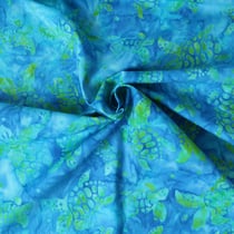 Tissu Coton imprimé Batik Tortika sur fond Bleu lagon - Au mètre