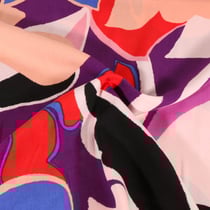 Tissu Viscose Floral abstrait rouge, bleu et noir sur fond Violet