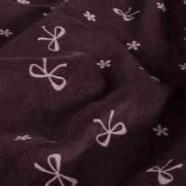 Tissu Velours milleraies Isaé noeuds Roses sur fond Prune foncé