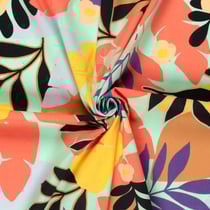 Tissu Coton stretch imprimé Feuilles noire, corail et violet sur fond Vert menthe