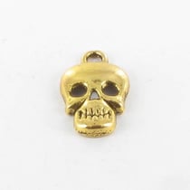 MégaCréa - Breloque en métal Tête de mort 16mm Doré (10 pièces)
