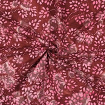Tissu Batik de Coton petites fleurs Rose framboise sur fond Bordeaux