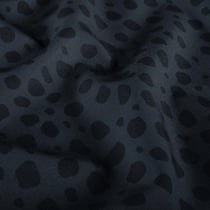 Tissu Softshell  Naya léopard Noir sur fond Gris