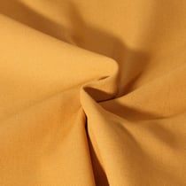 Tissu Toile Coton Canvas uni Mateo Jaune curcuma