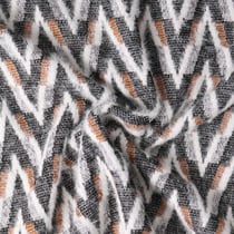 Tissu Maille chevrons duveteux Camel sur fond Noir