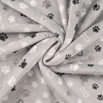 Tissu Doudou imprimé Patte de chien et os sur fond Gris clair - Au mètre