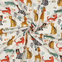 Tissu Popeline de Coton Léo animaux savane sur fond Blanc cassé
