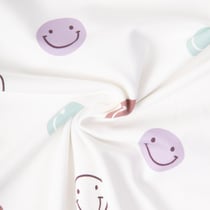 Tissu Sweat léger French Terry Smileys sur fond Blanc cassé