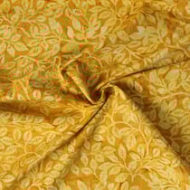 Tissu Coton imprimé Batik Sunleaf sur fond Jaune or - Au mètre