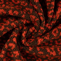Tissu Teddy Bouclettes motif léopard Orange sur fond Marron