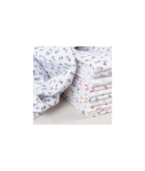Tissu coton fleurettes de 140 cm de largeur starlettekaki vendu par 50 cm