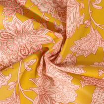 Tissu Coton enduit Sharma fleuris sur fond Jaune curry