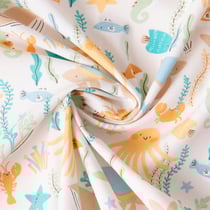 Tissu Coton imprimé Arty Animaux de l'océan Bubly sur fond Jaune pastel