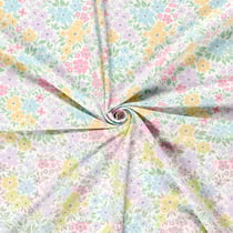 Tissu Jersey Coton Fleuris tons pâles sur fond Blanc