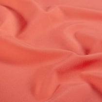 Tissu Polyester Solina sur fond Corail - Au mètre