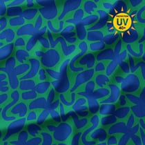 Tissu Lycra maillot de bain anti UV Swag bleu roi sur fond Vert gazon - Au mètre