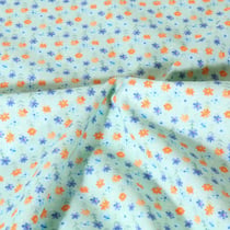 Tissu Popeline de Coton légère Petites fleurs sur fond Vert menthe