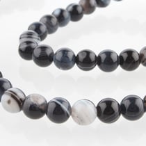 Fil de 60 perles ronde en pierre naturelle 6 mm AGATE RAYEE TEINTEE NOIR