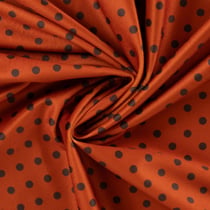 Tissu Velours ras d'habillement digital pois Noir sur fond Terracotta