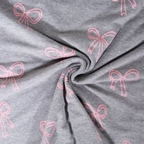 Tissu Jersey Mélangé Poppy Noeuds pailletés roses sur fond Gris chiné