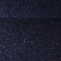 Tissu Fausse fourrure Mouton Toundra moucheté Rouge sur fond Bleu marine