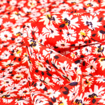 Tissu Jersey Viscose Fleurs et pâquerettes sur fond Rouge