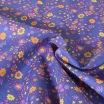 Tissu Popeline de Coton légère Fleuris jaune et parme sur fond Violet
