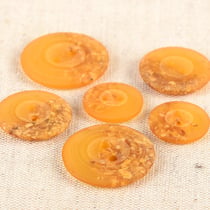 Bouton rond 2 trous copeaux 15mm jaune moutarde