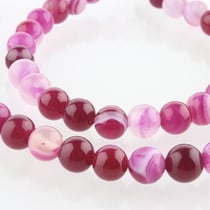 Fil de 60 perles ronde en pierre naturelle 6 mm AGATE RAYEE TEINTEE FUSHIA