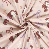 Tissu Jersey Coton imprimé Licorne et noeuds sur fond Rose bébé