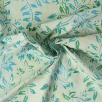 Tissu Coton imprimé Batik Luména sur fond Jaune pastel - Au mètre