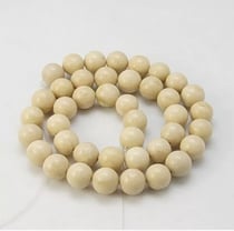 Fil de 56 perles ronde en pierre naturelle fabrication bijoux 6 mm FOSSILE