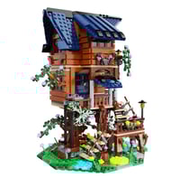 CaDA Maison dans l'arbre 4 saisons Bricks