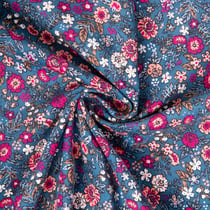 Tissu Velours milleraies imprimé Barjay fleuris bleu et rose sur fond Bleu jean