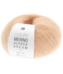Pelote de laine et alpaga LUXURY MERINO ALPAGA DREAM ARAN - Rico Design - Le fil noble et volumineux au toucher cocooning 02 Abricot