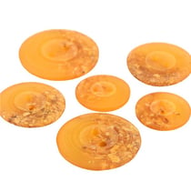 Bouton rond 2 trous copeaux 23mm jaune moutarde